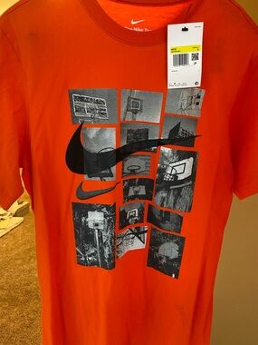 Nike Orange Tee with Black Graphic Swoosh